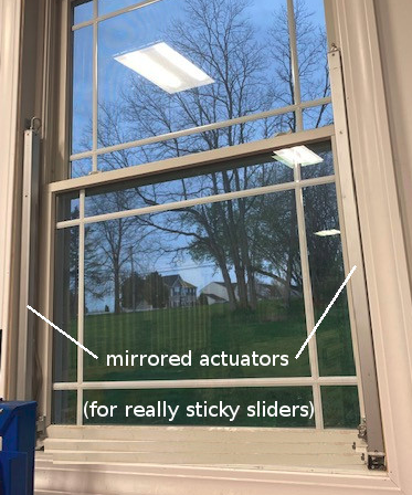 sticky or stuck window vertical slider with mirrored motors sticky or stuck windows vertical slider